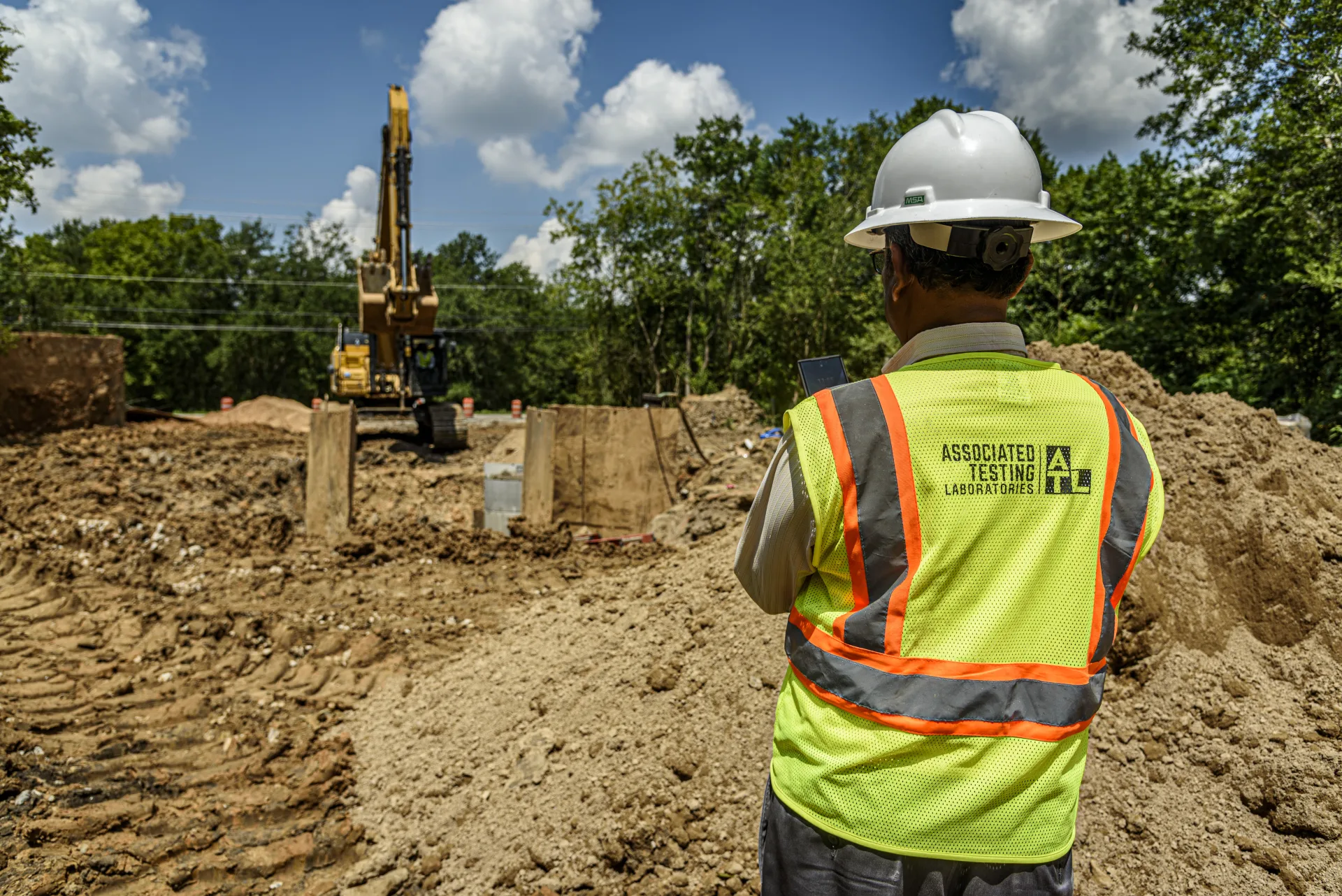 Associated Testing Laboratories field technician monitoring excavation at a City of Houston water line project