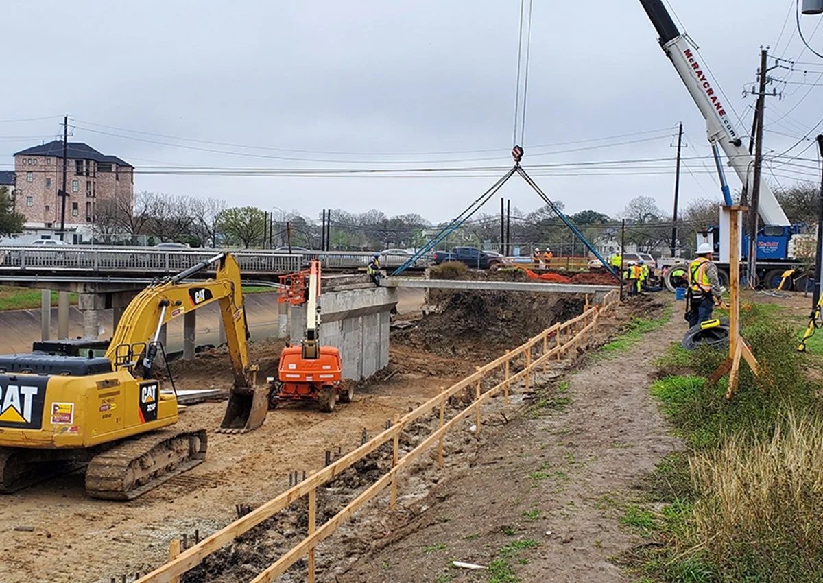 Stella Link Bridge Extension under construction over Brays Bayou during CMT and inspection services