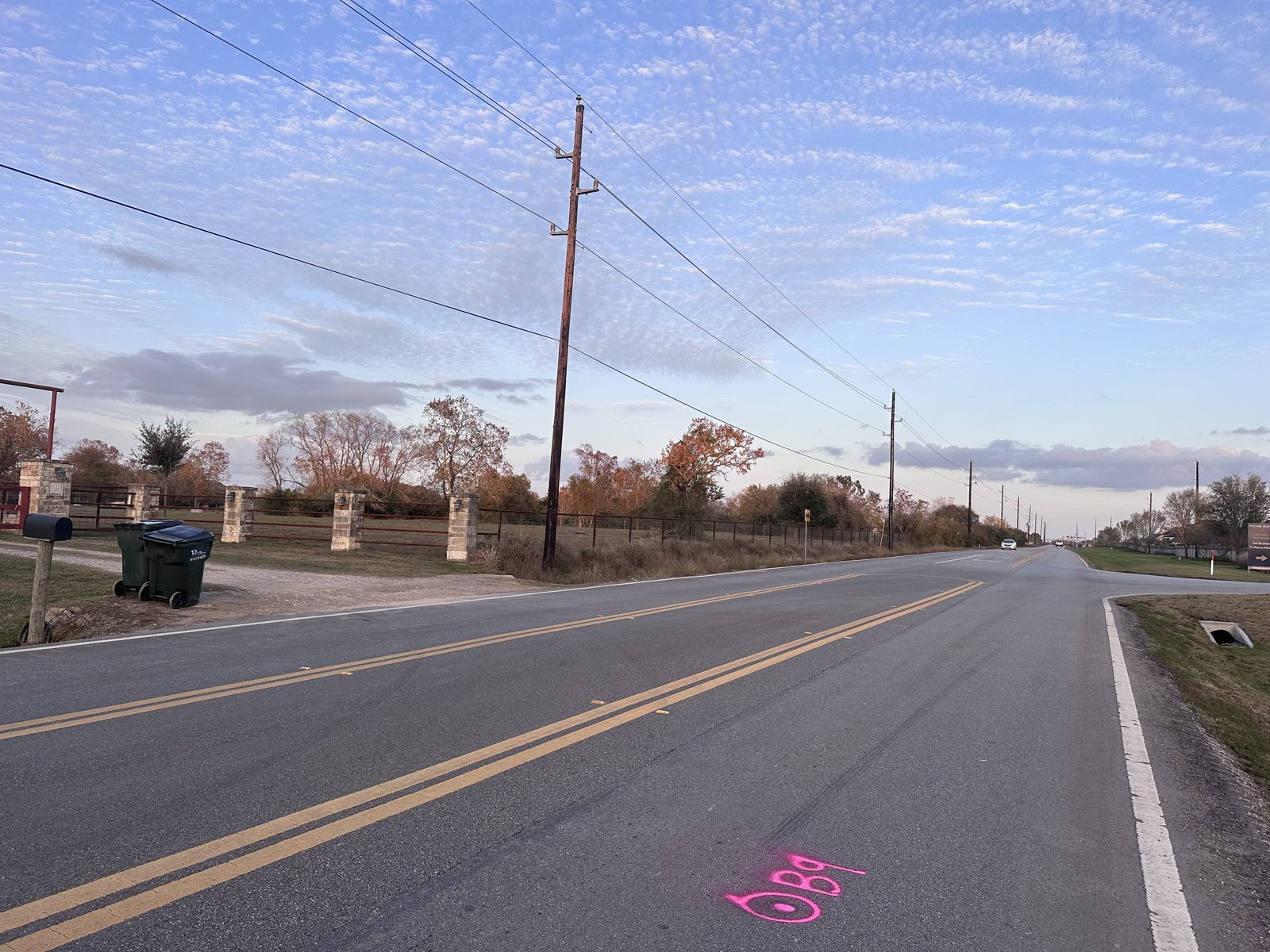 Boring location B-9 marked on the Rogers Road pavement