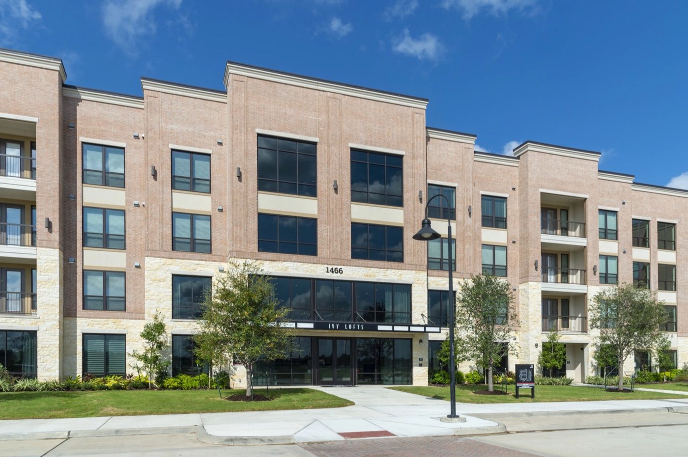 Ivy Lofts completed — finished street-level entrance
