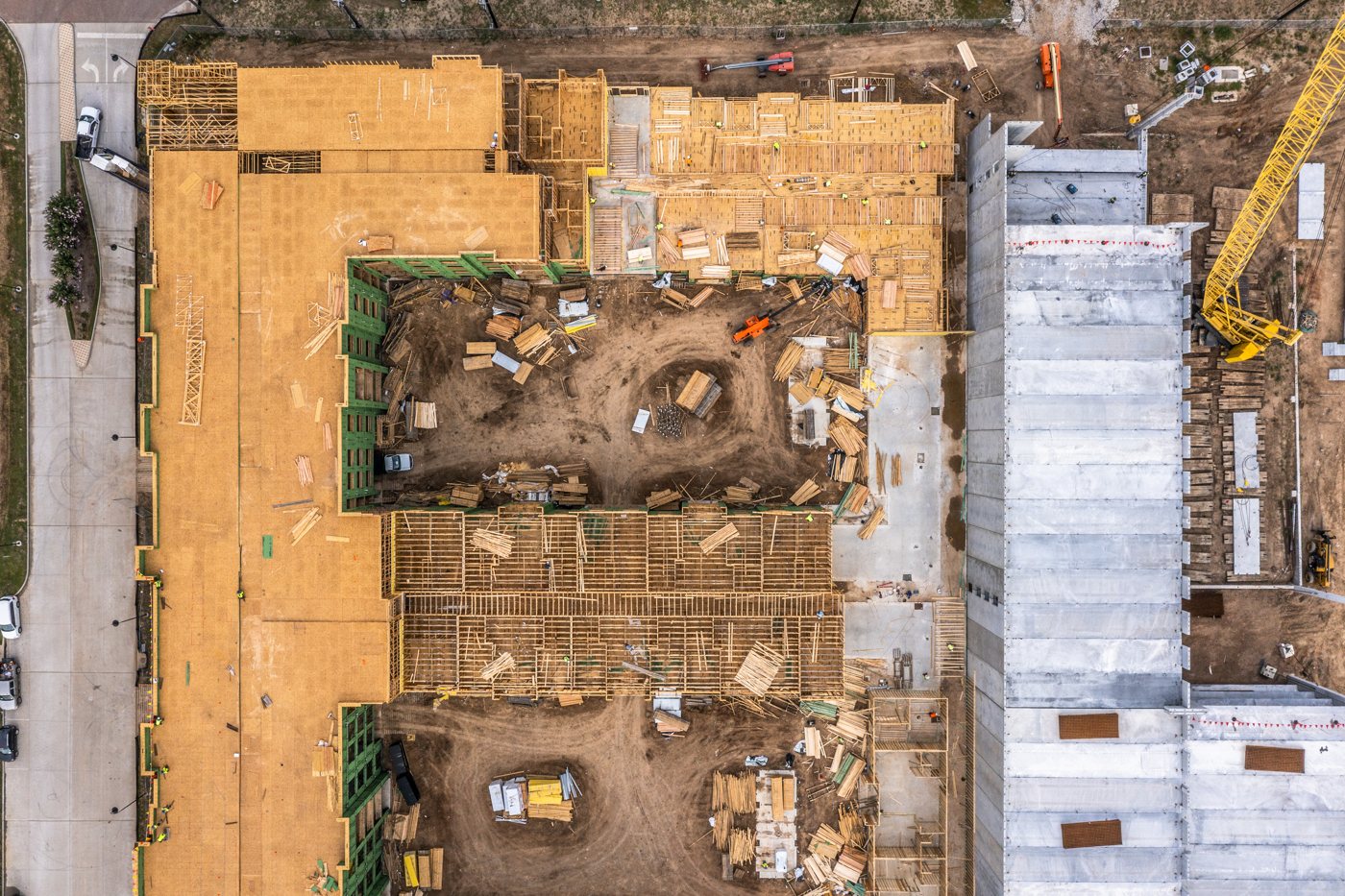 Top-down view of Ivy District Lofts floor framing during construction