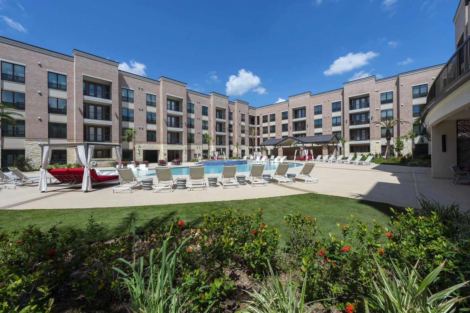Ivy District Lofts resort-style pool and courtyard after completion