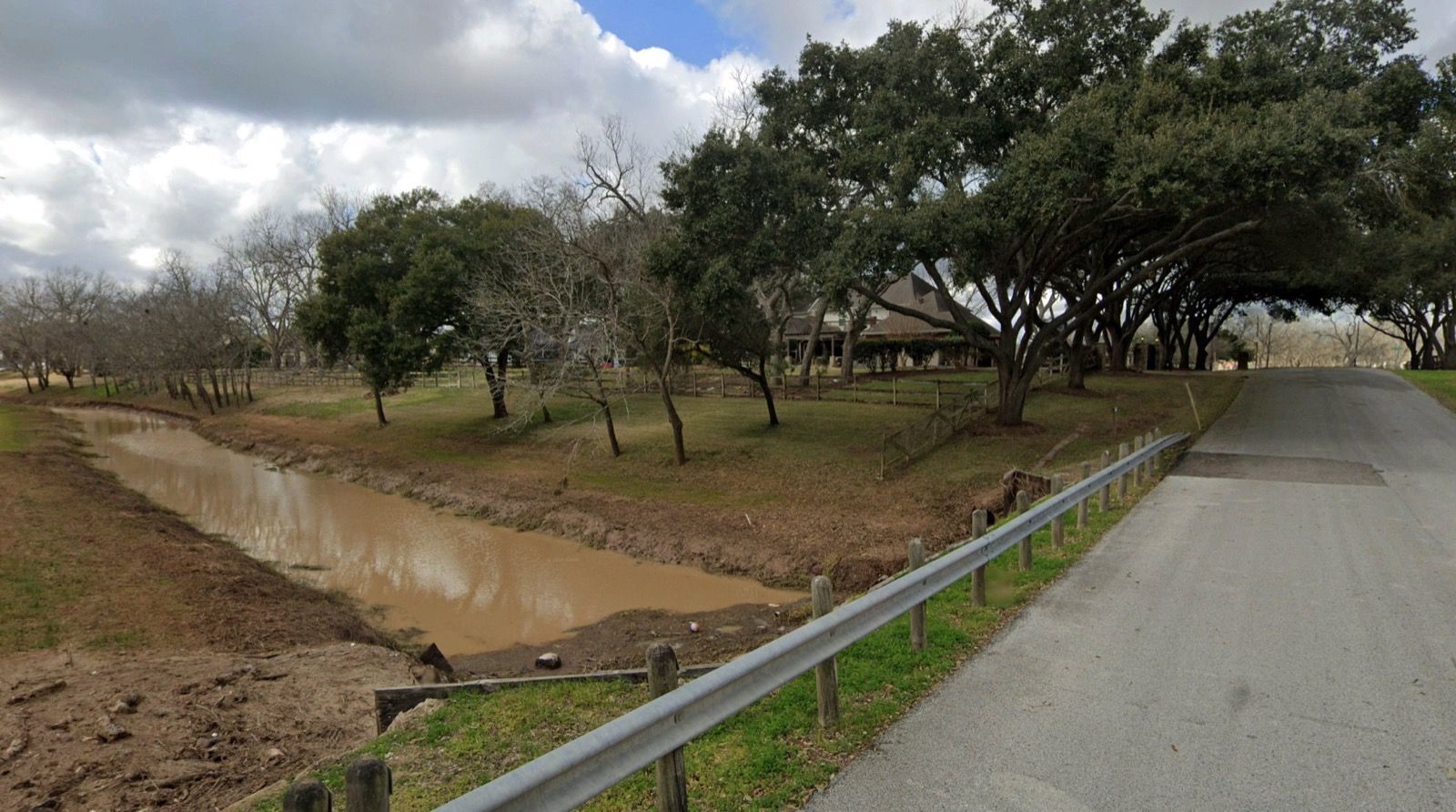 Existing Cedar Creek bridge and stream channel before construction