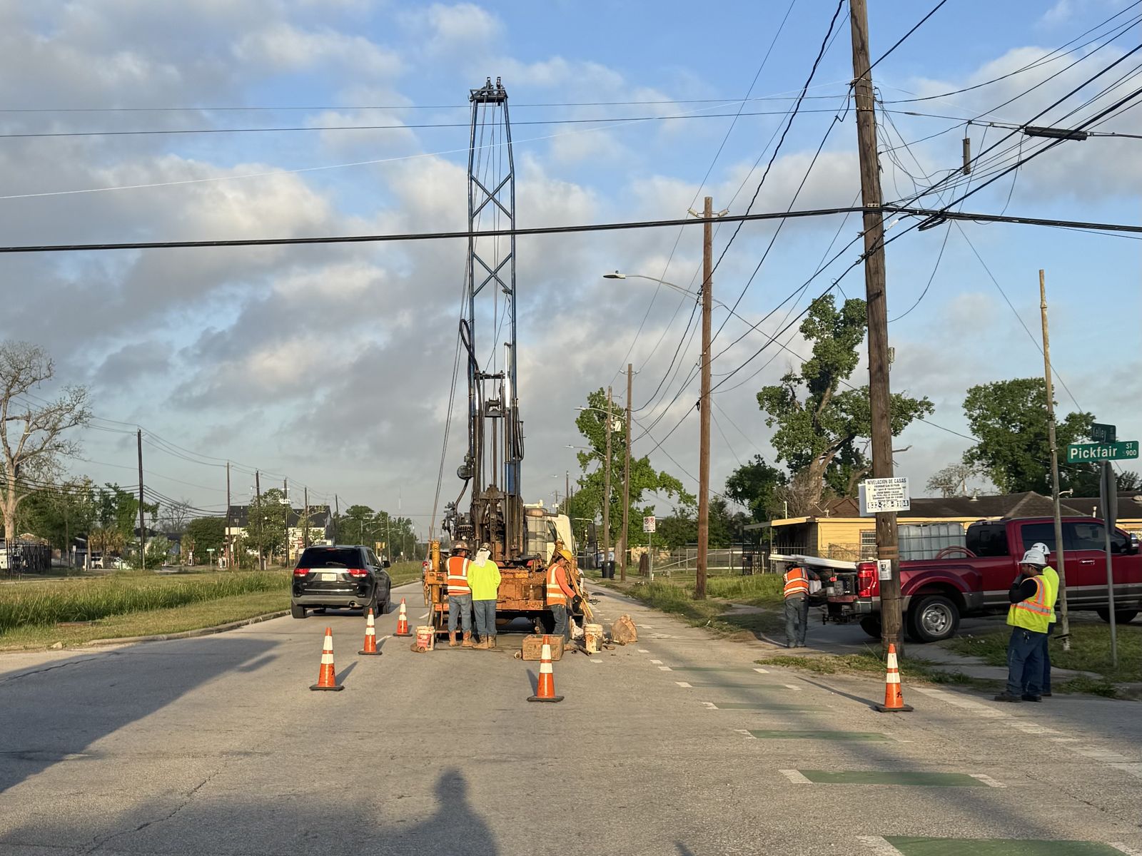 ATL field crew and drill rig in a coned-off lane along the 84-inch sanitary sewer alignment