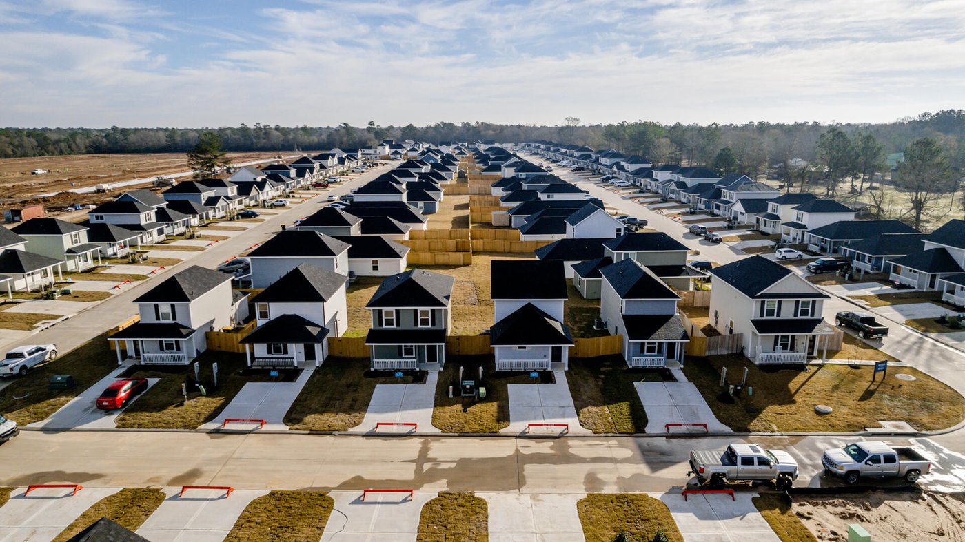 Rows of completed homes in a new single-family subdivision along Houston's growth corridor