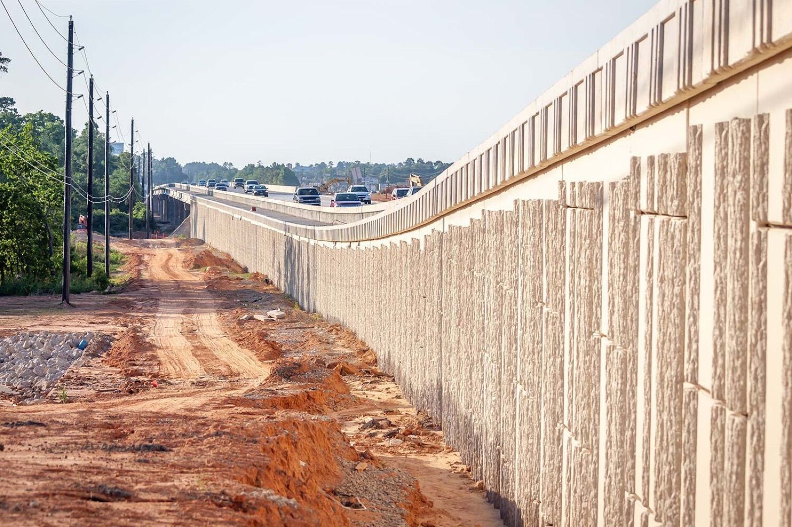 Retaining wall and bridge structure along Tomball Parkway