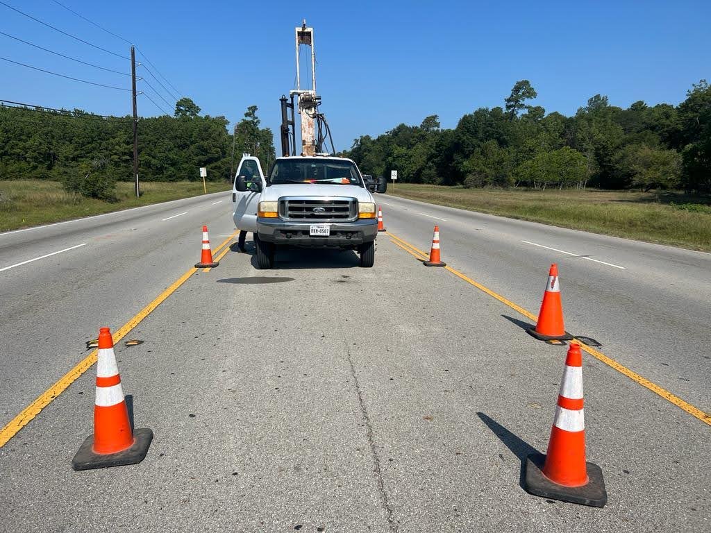 ATL field truck approaching a coned-off boring location on Will Clayton Parkway