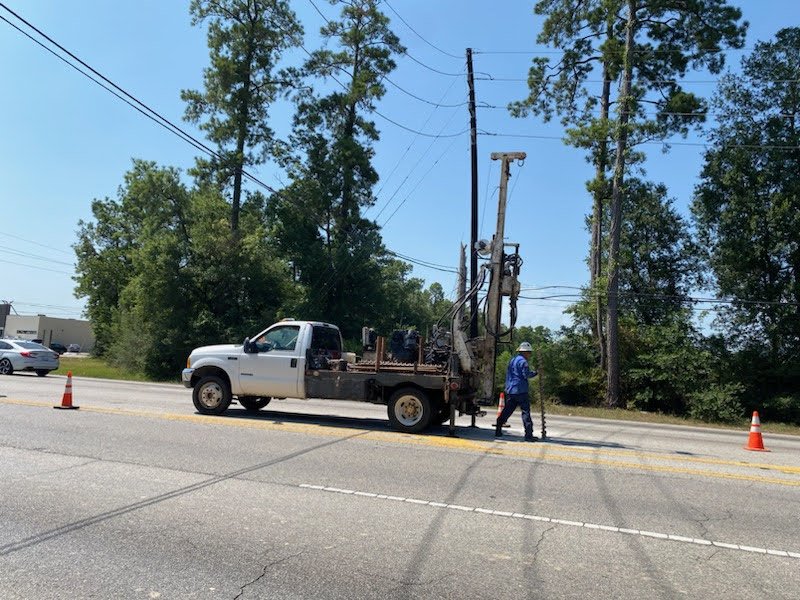 ATL drill rig set up beneath the tree line along the Will Clayton Parkway alignment